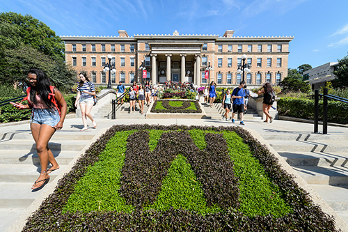 Agriculture Hall with students walking down the steps